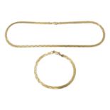 A 9ct Italian Herringbone link zig-zag design necklace and bracelet suite.