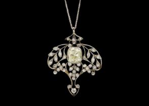An exquisite Belle Époque diamond pendant with certified Old Mine cut 3.97ct light yellow diamond.