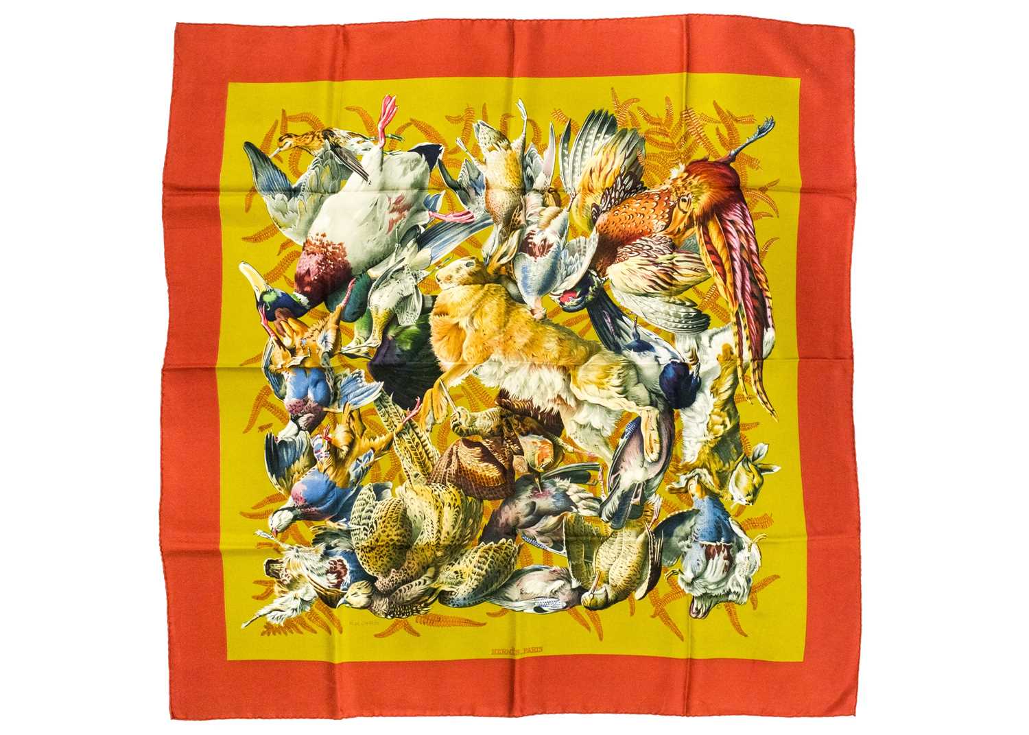 HERMES - A printed silk scarf in 'Gibiers' pattern.