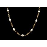 A 9ct fancy link necklace with fifteen cultured pearl spacers.