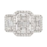 An impressive diamond set large triple cluster dress ring set in 9ct white gold.