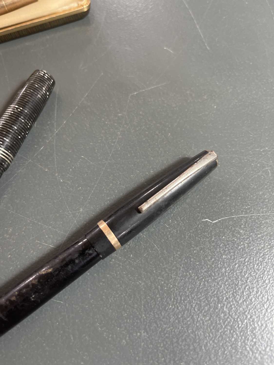 A 9ct cased Waterman's pen and two Parker pens. - Image 4 of 4