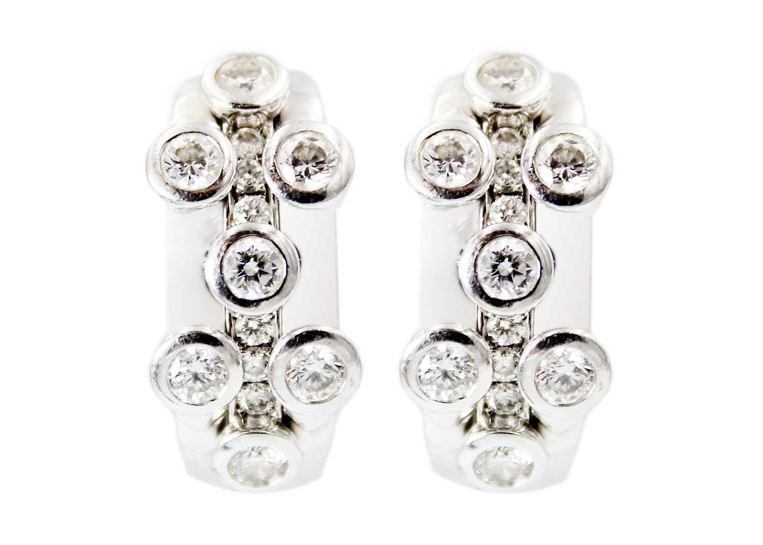 Hans D. Krieger - A stunning pair of 18ct white gold diamond set earrings.