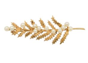 A 9ct rose gold pearl set leaf brooch.