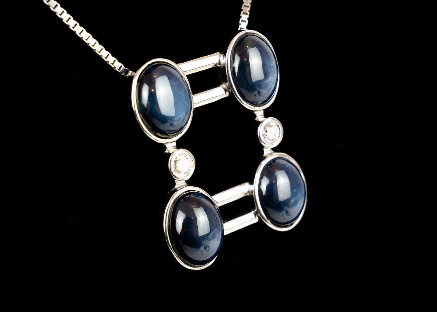 An 18ct white gold contemporary star sapphire and diamond set pendant necklace. - Image 3 of 4