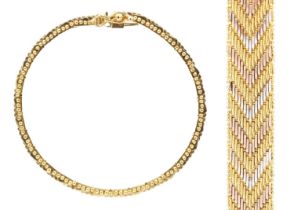 An 18ct tri-colour gold chevron design bracelet.