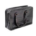 A Prada black crocodile skin handbag.
