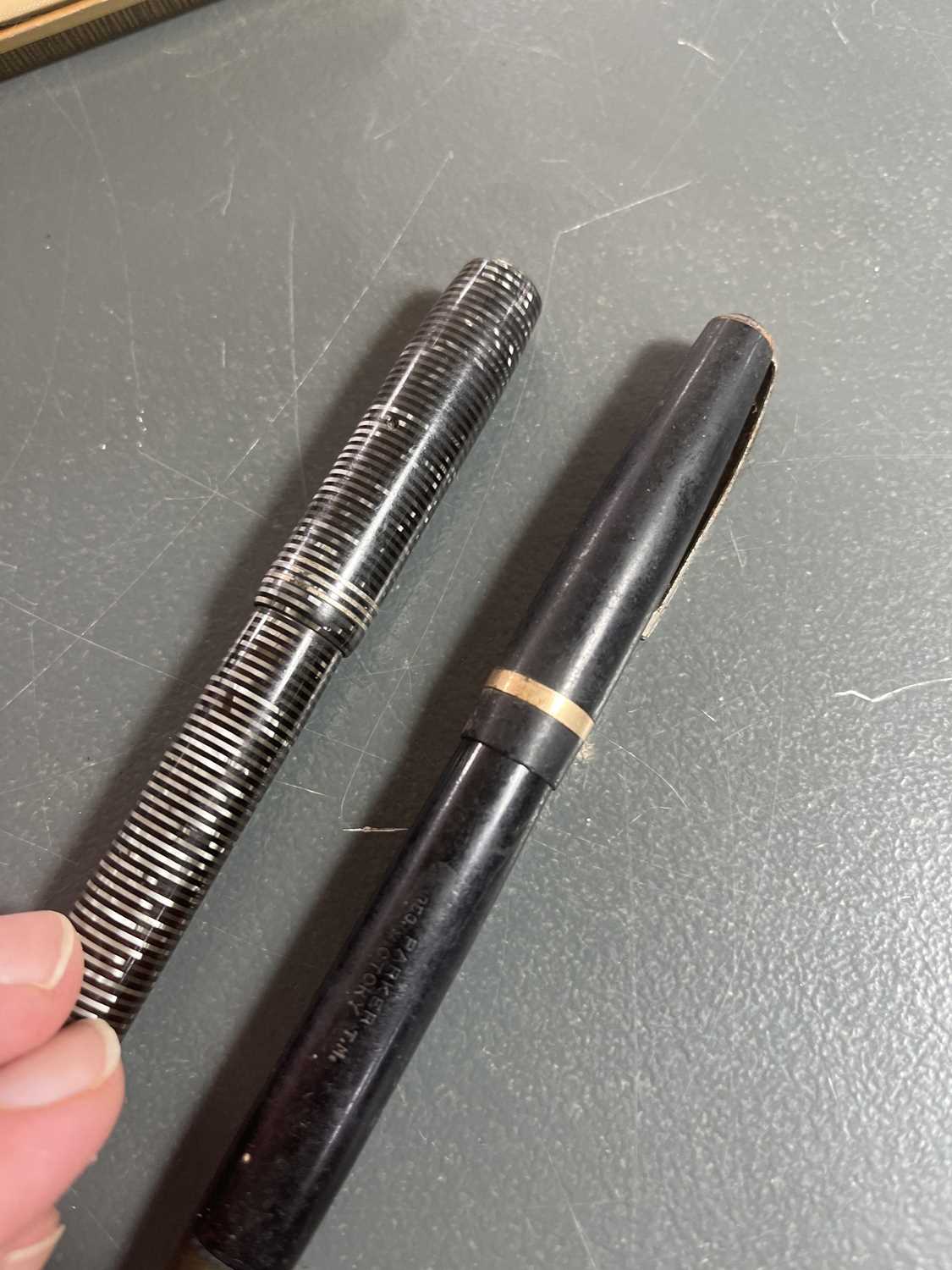 A 9ct cased Waterman's pen and two Parker pens. - Image 3 of 4