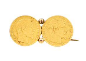 A brooch set with two 5 Francs gold coins.