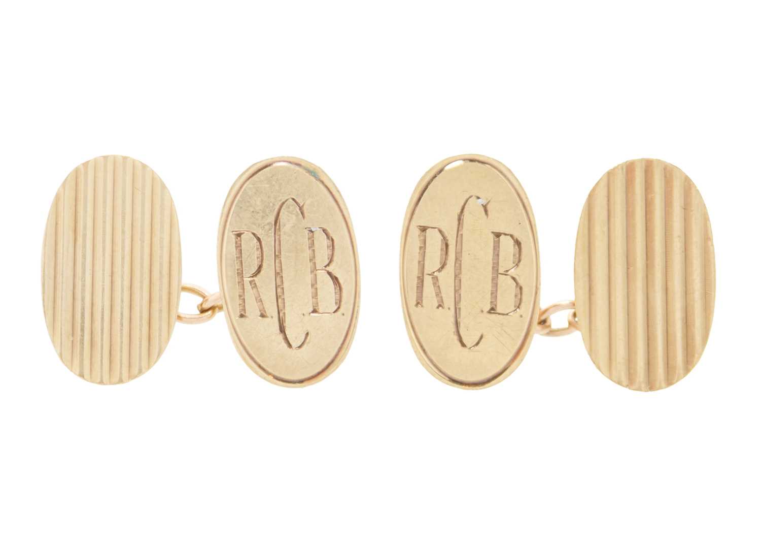 A pair of 9ct oval cufflinks.