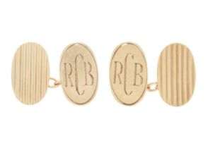 A pair of 9ct oval cufflinks.