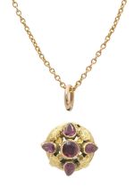 A Victorian high purity gold almandine garnet set small circular brooch; and a 9ct necklace.