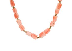 A carved coral bead necklace with gold ball spacers and 9ct clasp.