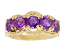 A 14ct amethyst set five stone ring.