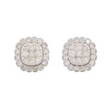 A pair of 14ct white gold rounded square diamond cluster stud earrings.