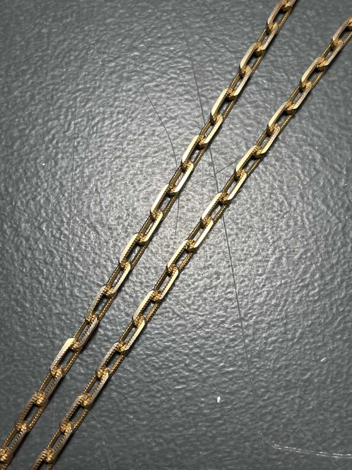 A 10ct gold rectangular textured link necklace. - Image 5 of 6