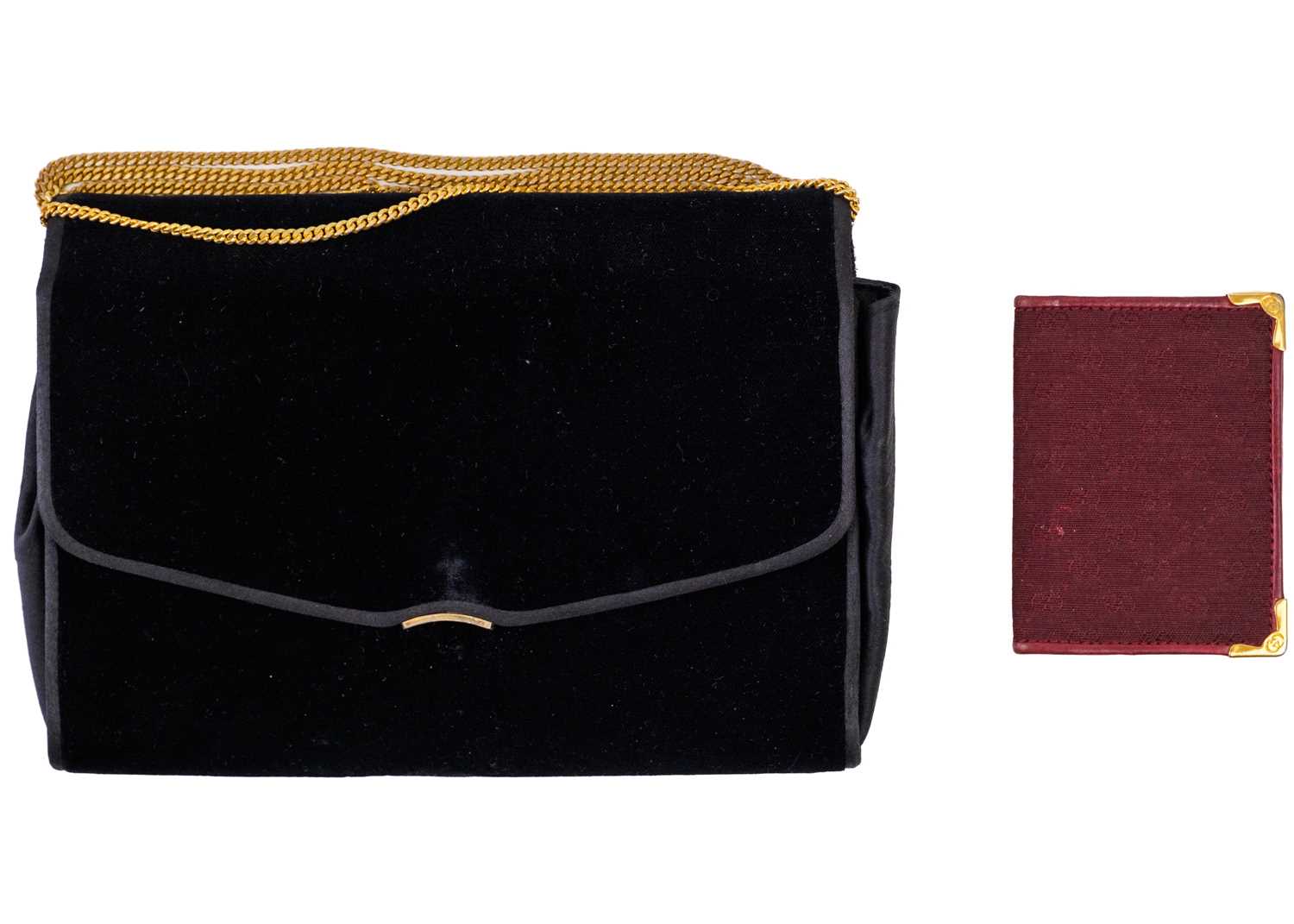 A Gucci black velvet handbag and a Gucci pocketbook.