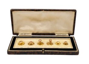 A 9ct cased set of six dress shirt studs inscribed 'The OP set'.