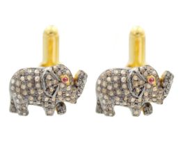 A pair of silver gilt diamond and ruby set elephant cufflinks.