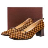 LOUIS VUITTON - A pair of Damier pony and leather pumps, size 40 1/2.