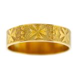 An 18ct band ring with Maltese cross design.