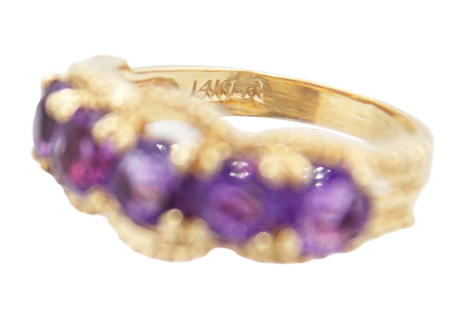 A 14ct amethyst set five stone ring. - Image 3 of 3