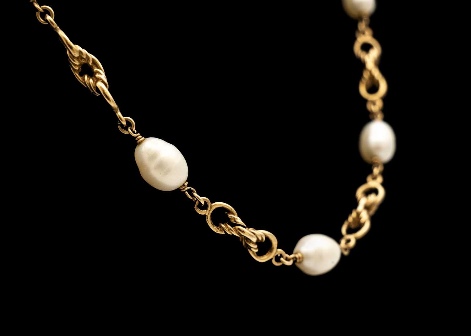 A 9ct fancy link necklace with fifteen cultured pearl spacers. - Image 2 of 4