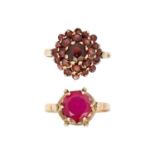 A 14ct synthetic ruby dress ring and a 9ct garnet cluster ring.