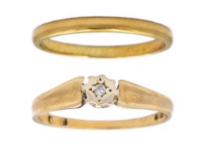 An 18ct band ring and a 9ct diamond set solitaire ring.