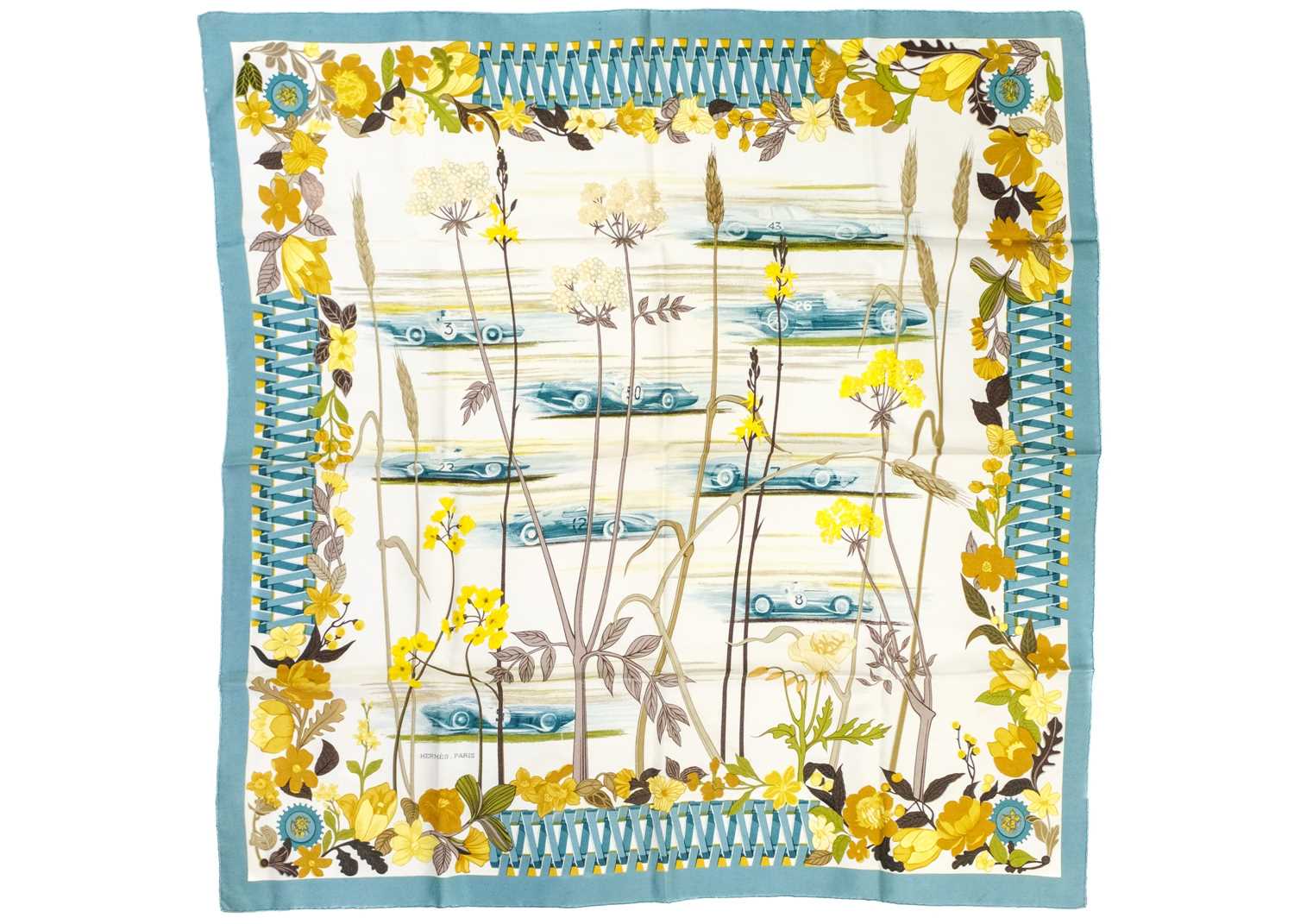 HERMES - A printed silk scarf 'Les Bolides'.