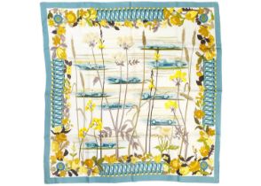 HERMES - A printed silk scarf 'Les Bolides'.