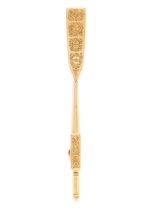 A Victorian 15ct bar brooch in the form of an oar.