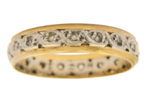An 18ct and Palladium diamond set full eternity ring.