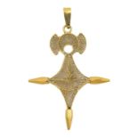 A high-purity gold (tests 18ct) filigree pendant.