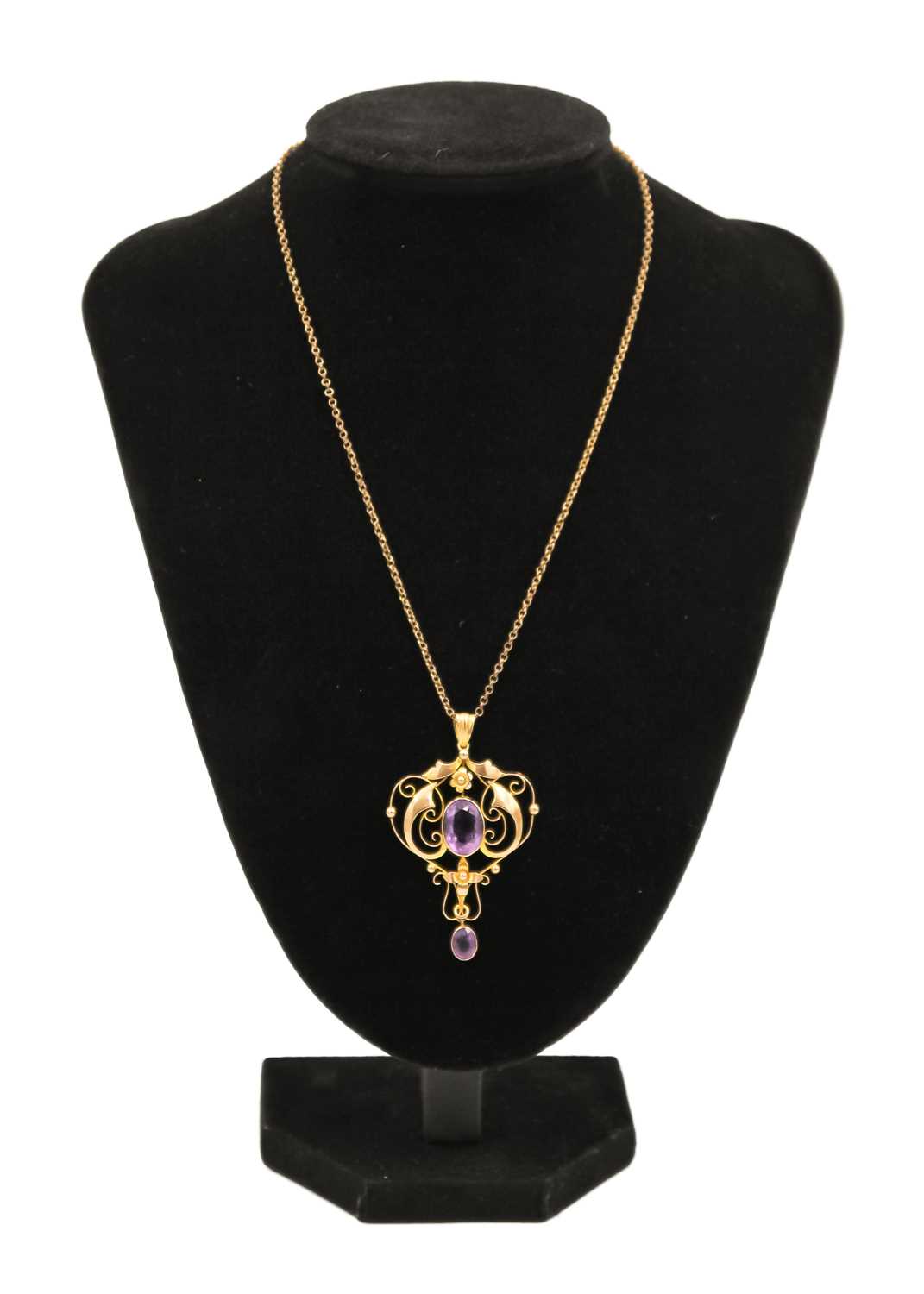 A 9ct amethyst set Art Nouveau openwork pendant on 9ct necklace. - Image 3 of 3