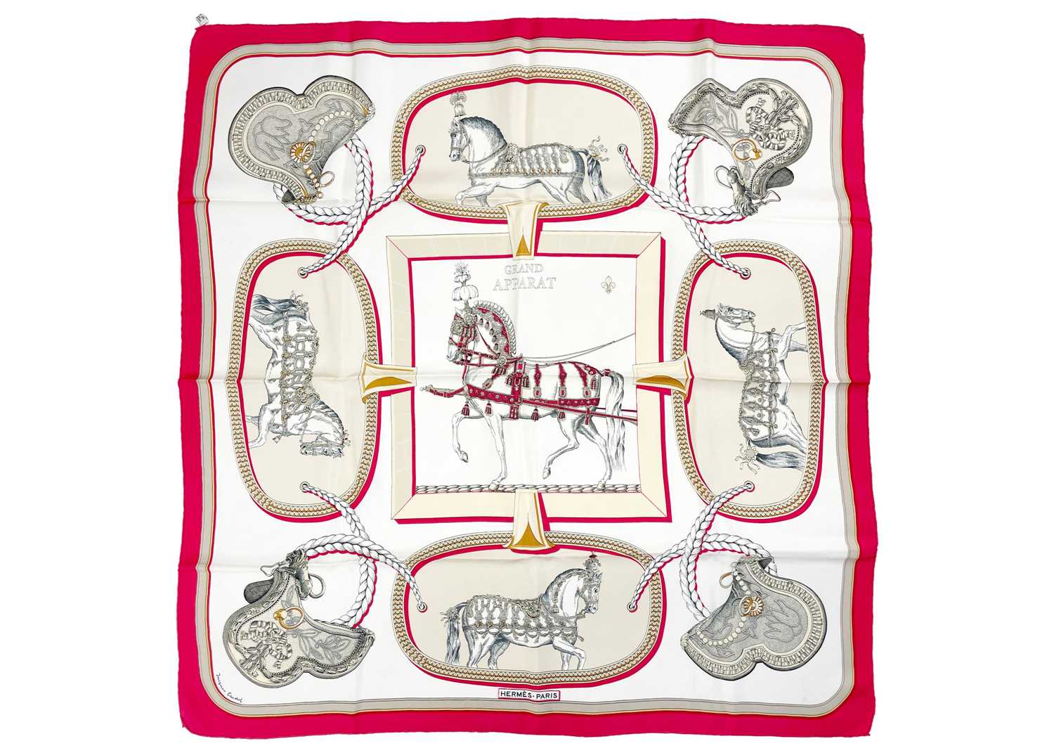 HERMES - A printed silk scarf in 'Grand Apparat' pattern.