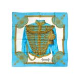 HERMES - A silk scarf in 'Brandebourgs' pattern.