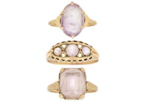 Three 9ct amethyst set rings.