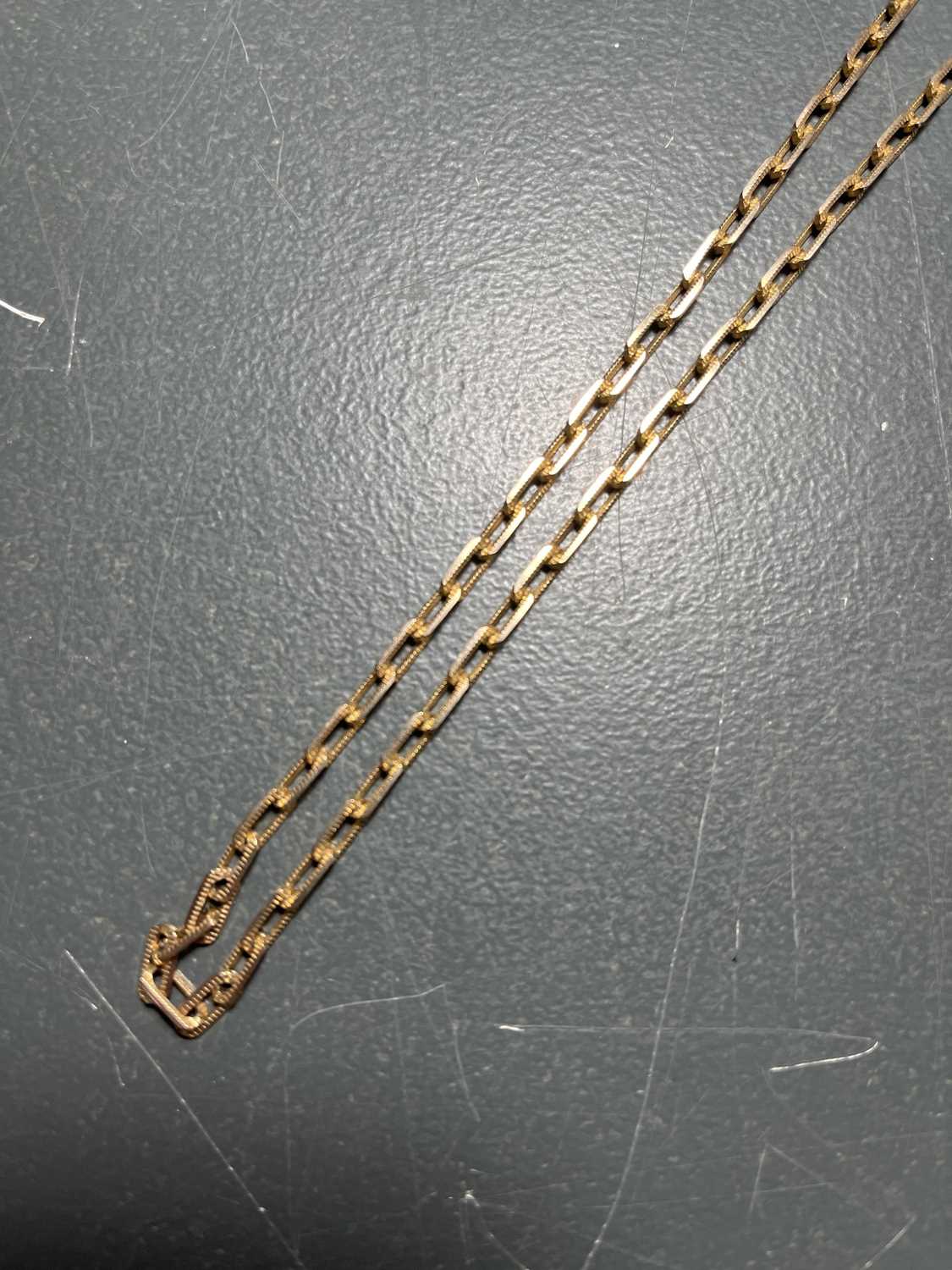 A 10ct gold rectangular textured link necklace. - Image 4 of 6