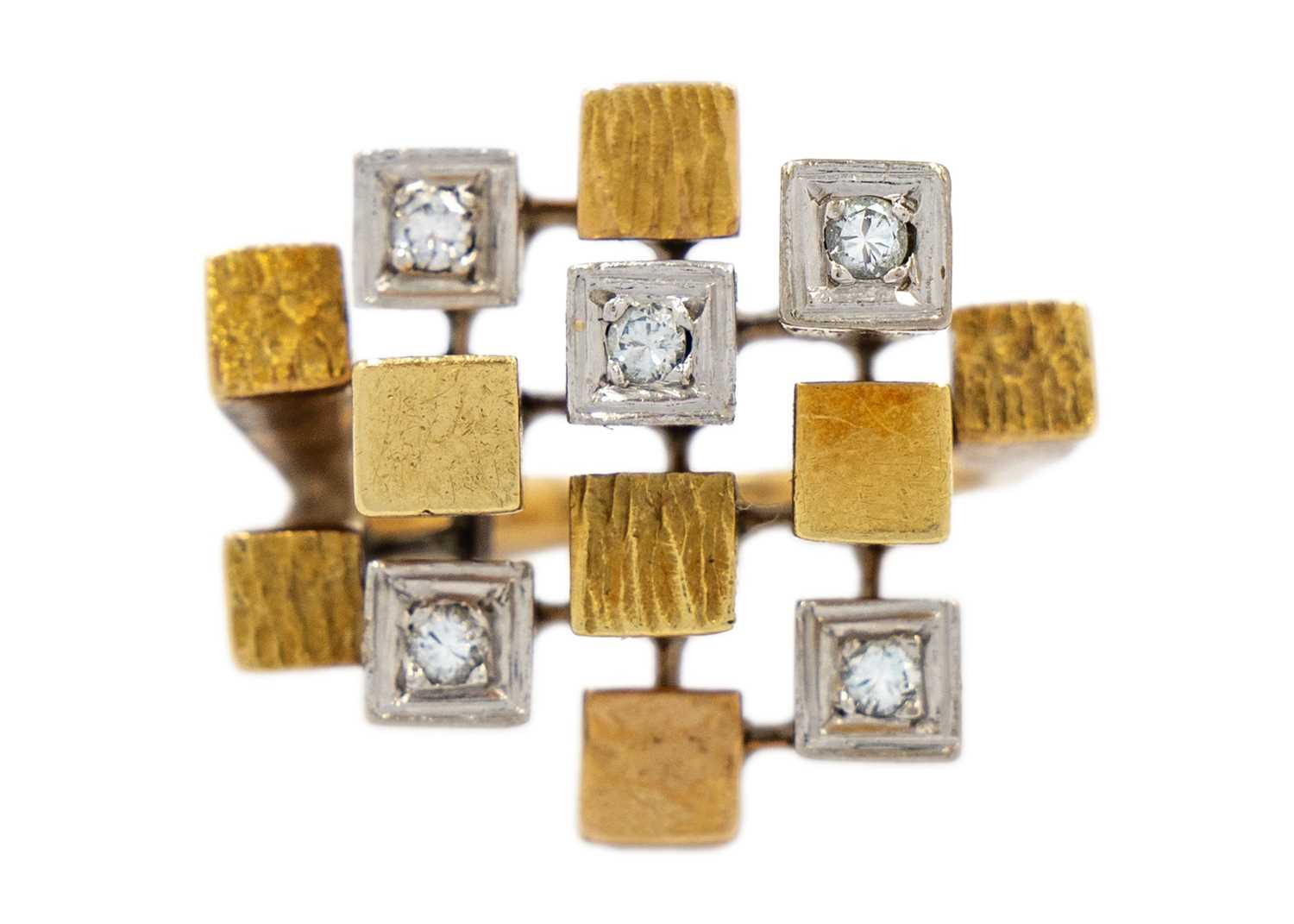 A stylish Modernist 18ct diamond set cube design ring in the style of Bjorn Weckstrom.