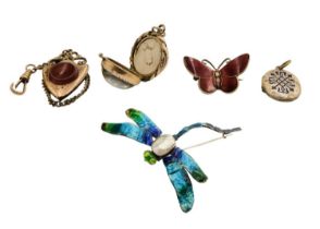 A selection of five interesting items of jewellery.