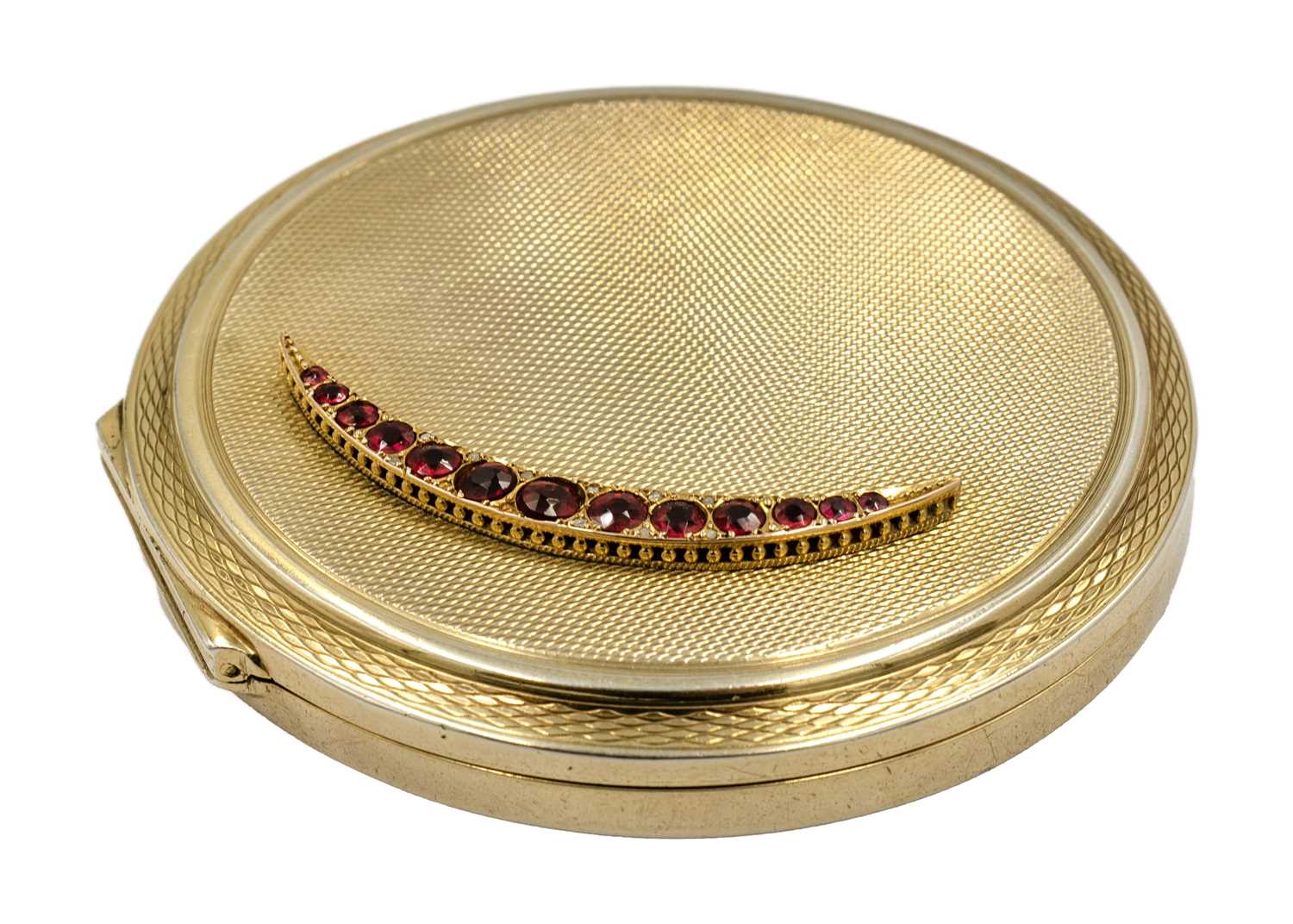 A modern silver gilt compact applied with a 9ct garnet and diamond crescent. - Image 3 of 5