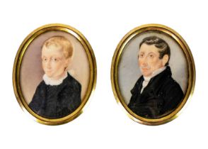 Two oval portrait miniatures of a father and son.