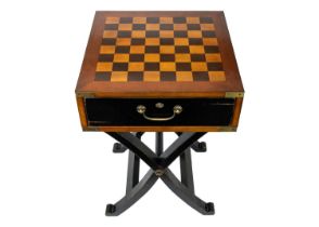 A Staunton pattern ebonised and boxwood chess set, and a small chess table.