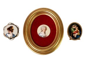 A German porcelain painted miniature plaque, after Raphael, Madonna and child.