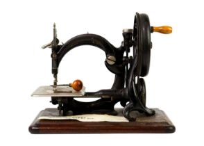 A Willcox & Gibbs sewing machine.
