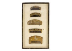 A collection of five Japanese gold lacquer combs, Meiji period.
