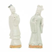 A pair of Chinese celadon figures of attendants, 19th century.