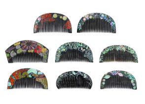 Eight Japanese black lacquer combs, 20th century.