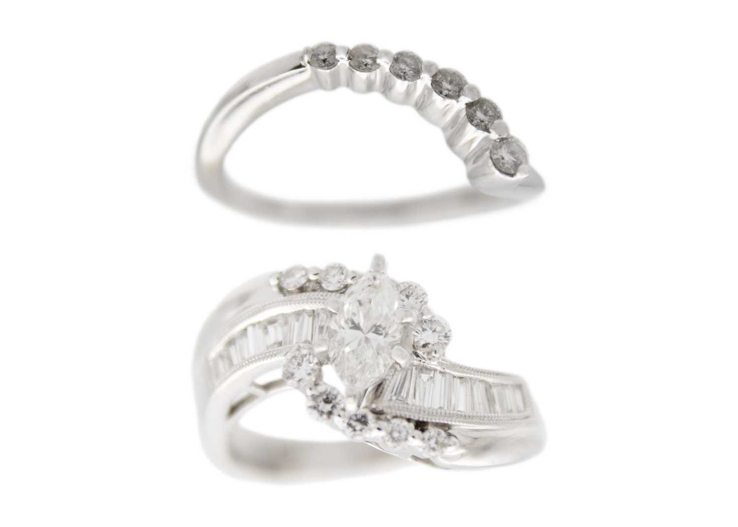 A good contemporary 18ct white gold diamond set crossover design dress ring and integral band ring.